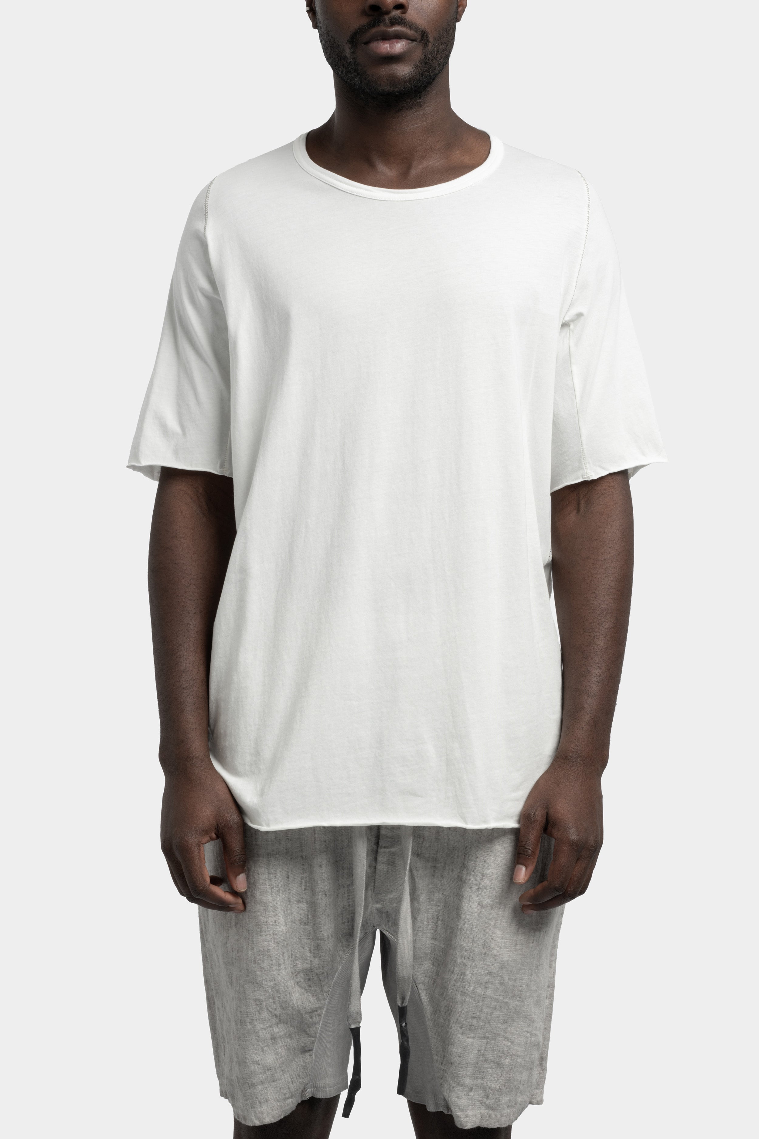 69 by Isaac Sellam | SS25 - Staple spine detail raglan t
