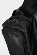 Large silver stapled leather backpack