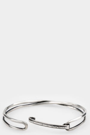 Crossed bangle bracelet
