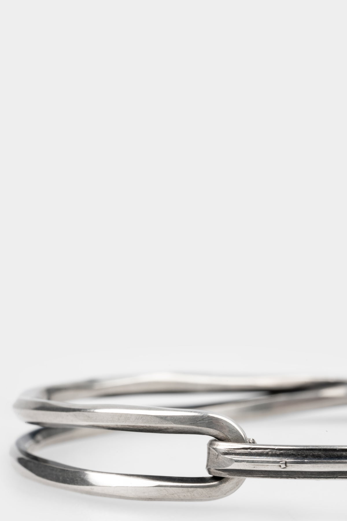 Crossed bangle bracelet
