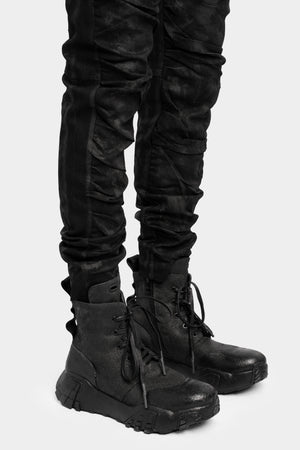 Tar coated canvas boots