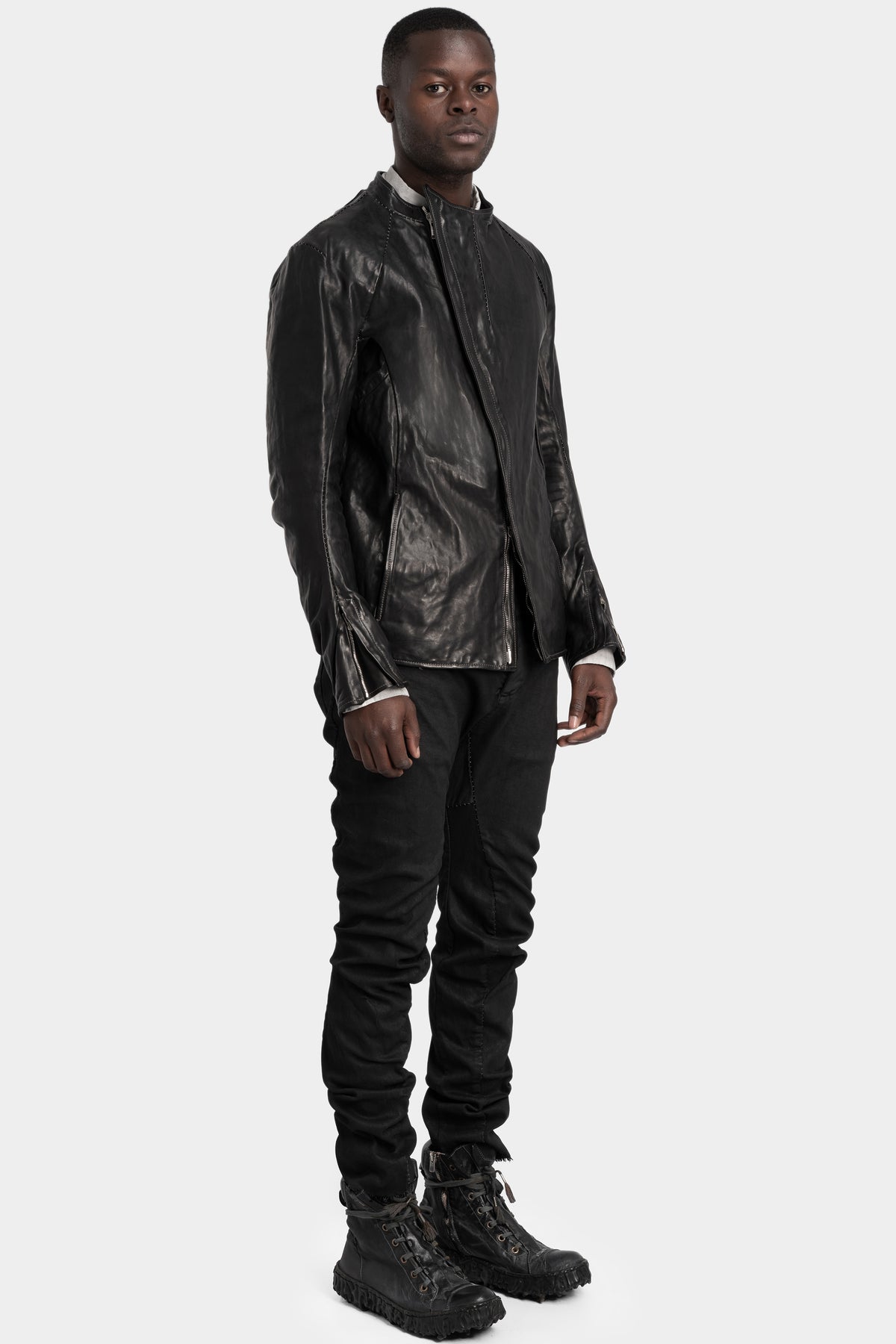 Collarless curved zip leather jacket