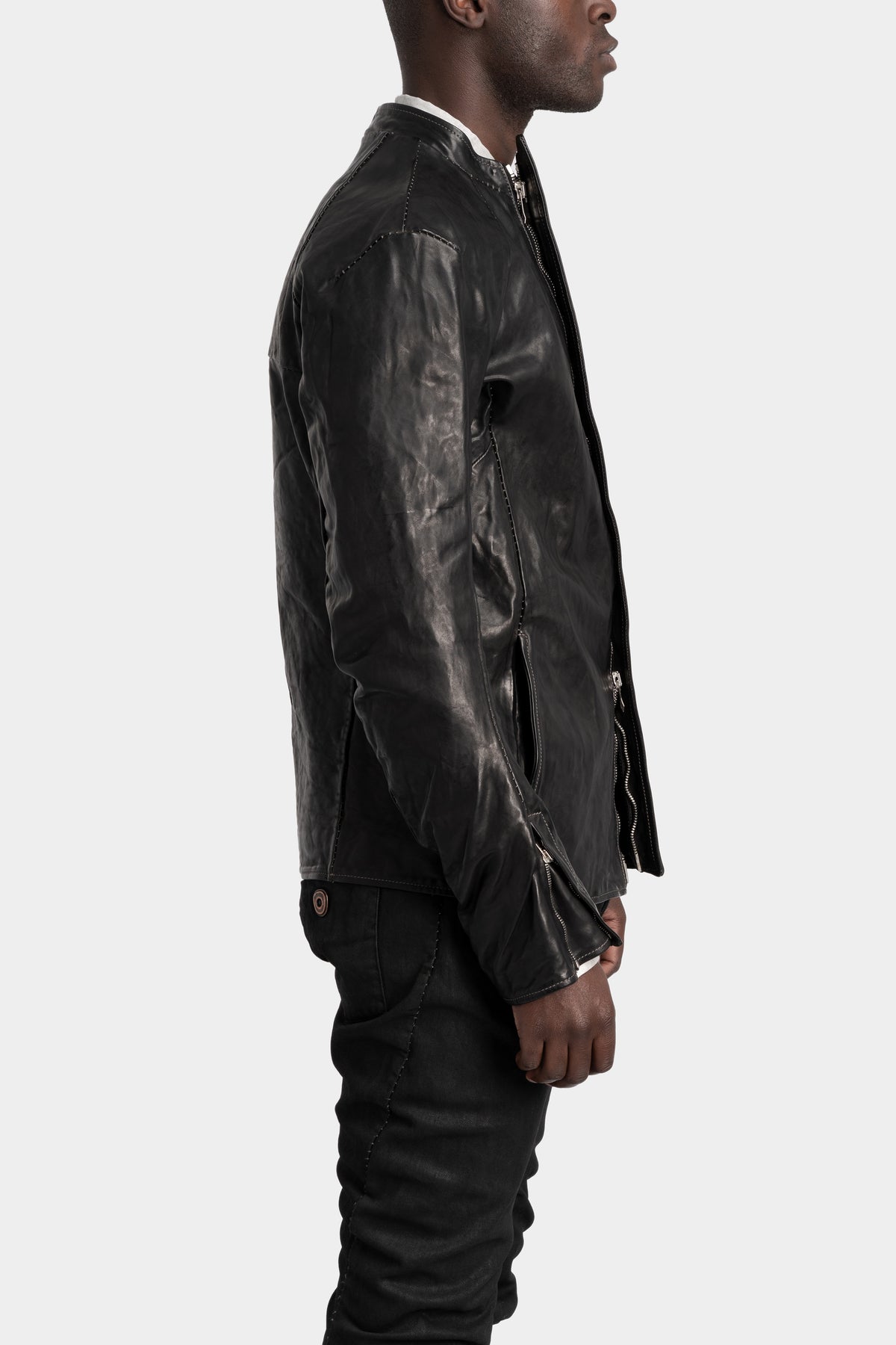 Collarless curved zip leather jacket