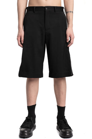 Comme des Garçons Homme Plus | SS26 - Wool gabardine side zip shorts P053, front view