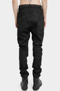 Resinated raw jeans