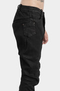 Resinated scar-stitched jeans