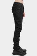 Resinated scar-stitched jeans