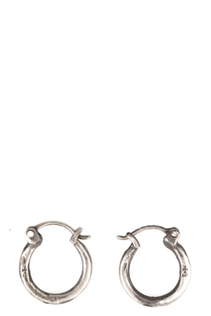 Certain Pace | Silver earrings, shot on table