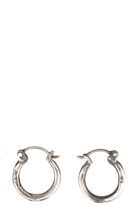 Certain Pace | Silver earrings, shot on table