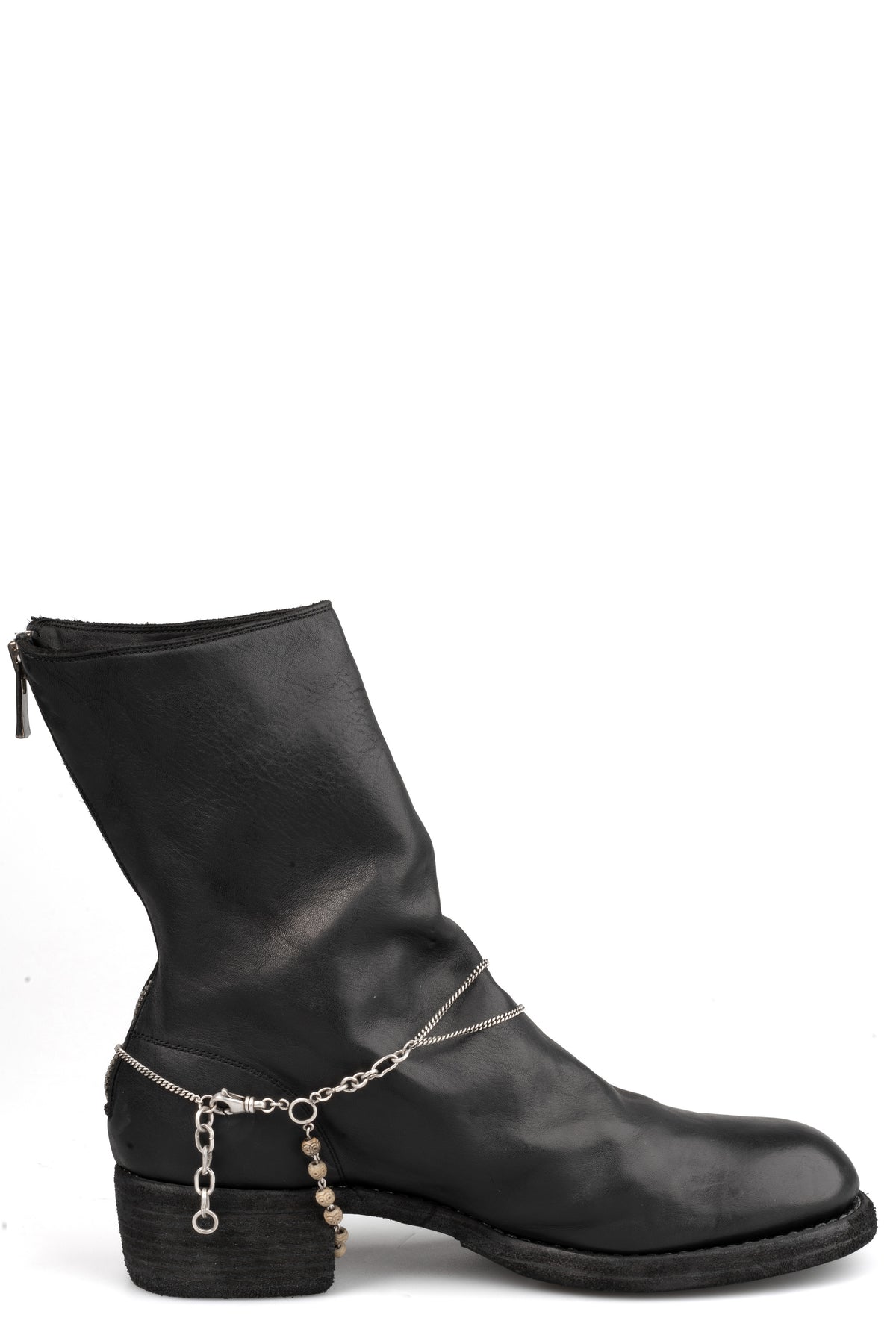 Certain Pace | Boot chain, shot on table