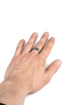 Silver band ring with black diamond