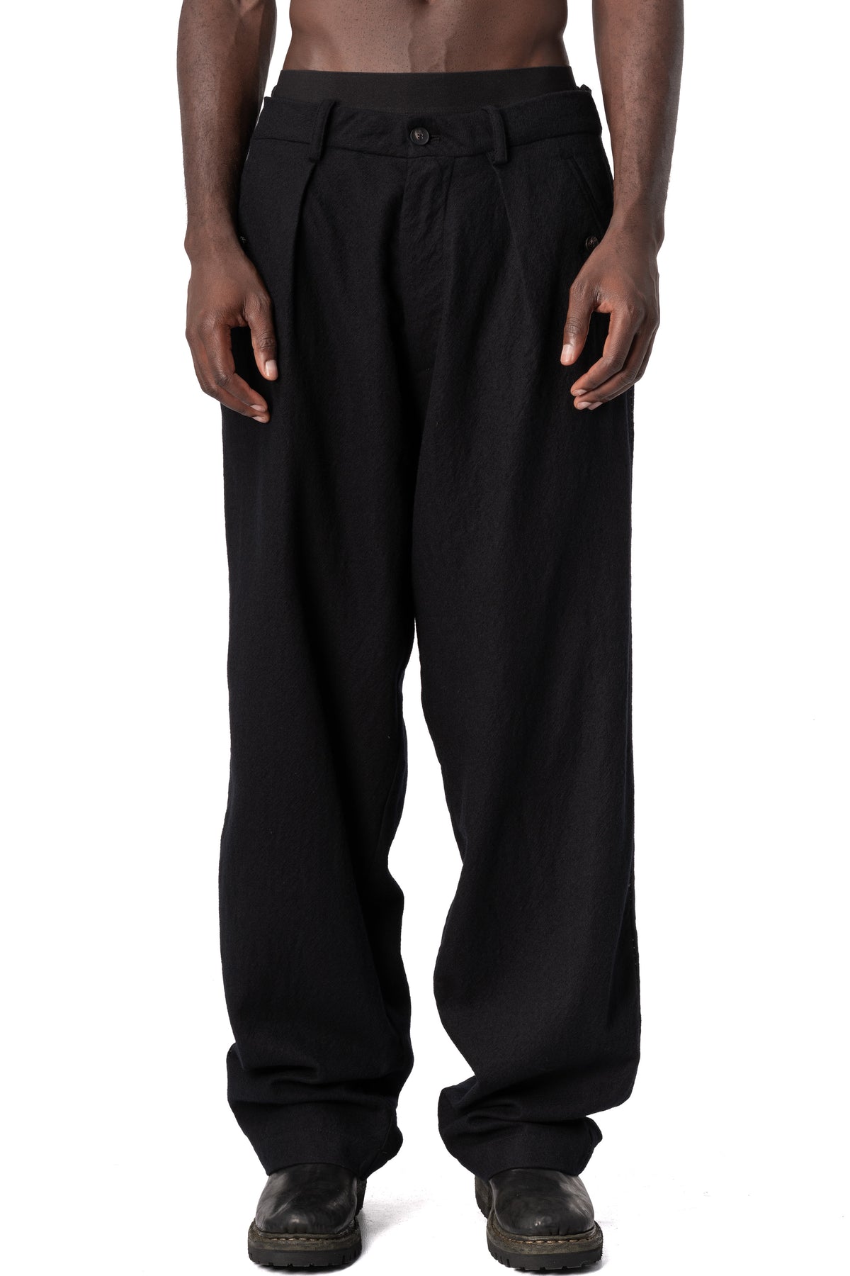 Masnada | AW26 - Pleated wool wide-leg trousers, Black M3722, front view on model