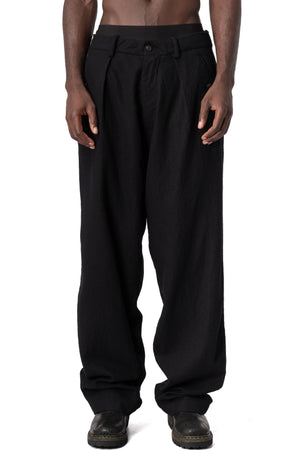 Masnada | AW26 - Pleated wool wide-leg trousers, Black M3722, front view on model