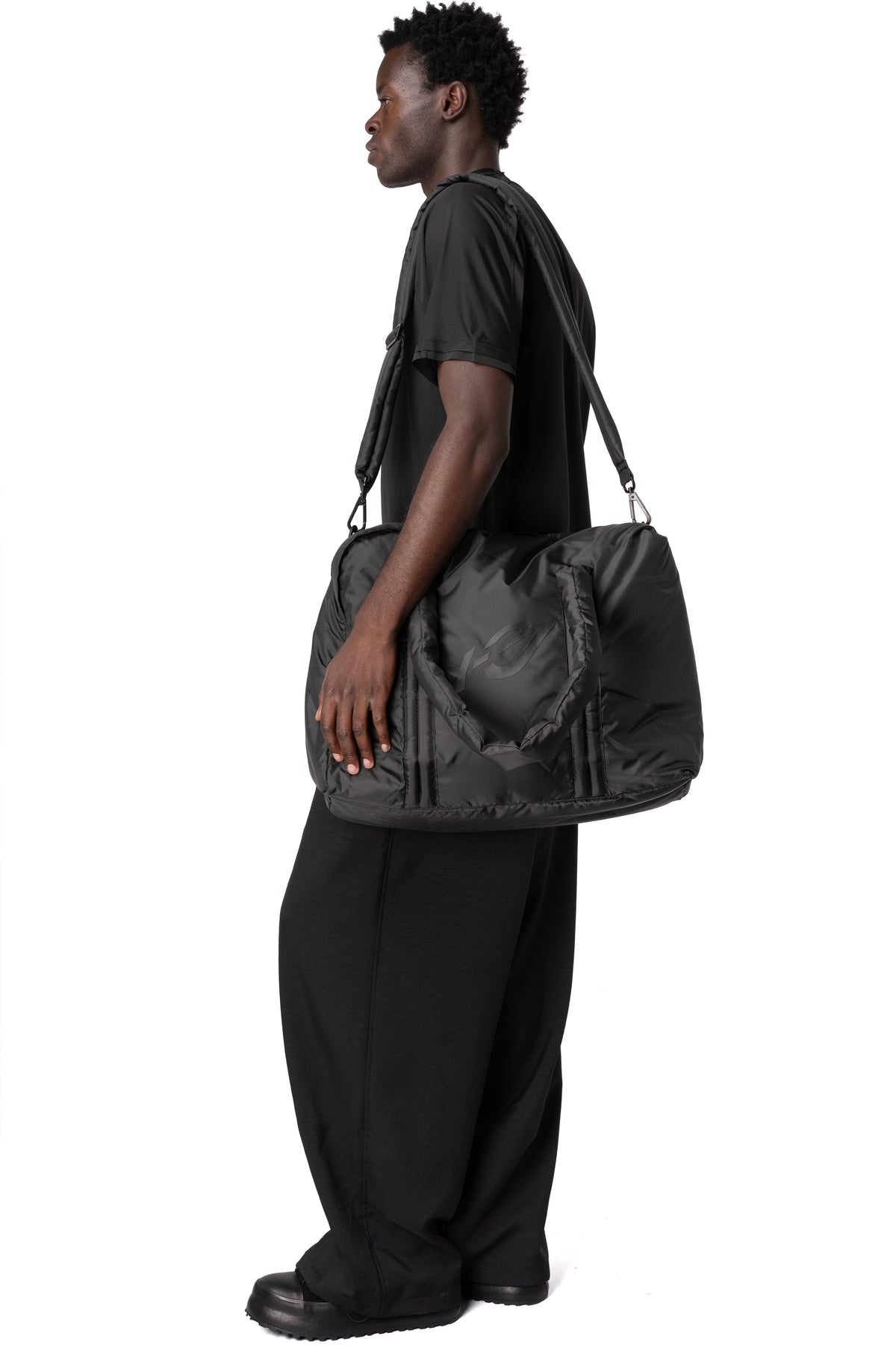 Y-3 | AW26 - Padded weekender bag KW5920, shot on table