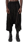 Oversized low-crotch wrinkled jersey trousers