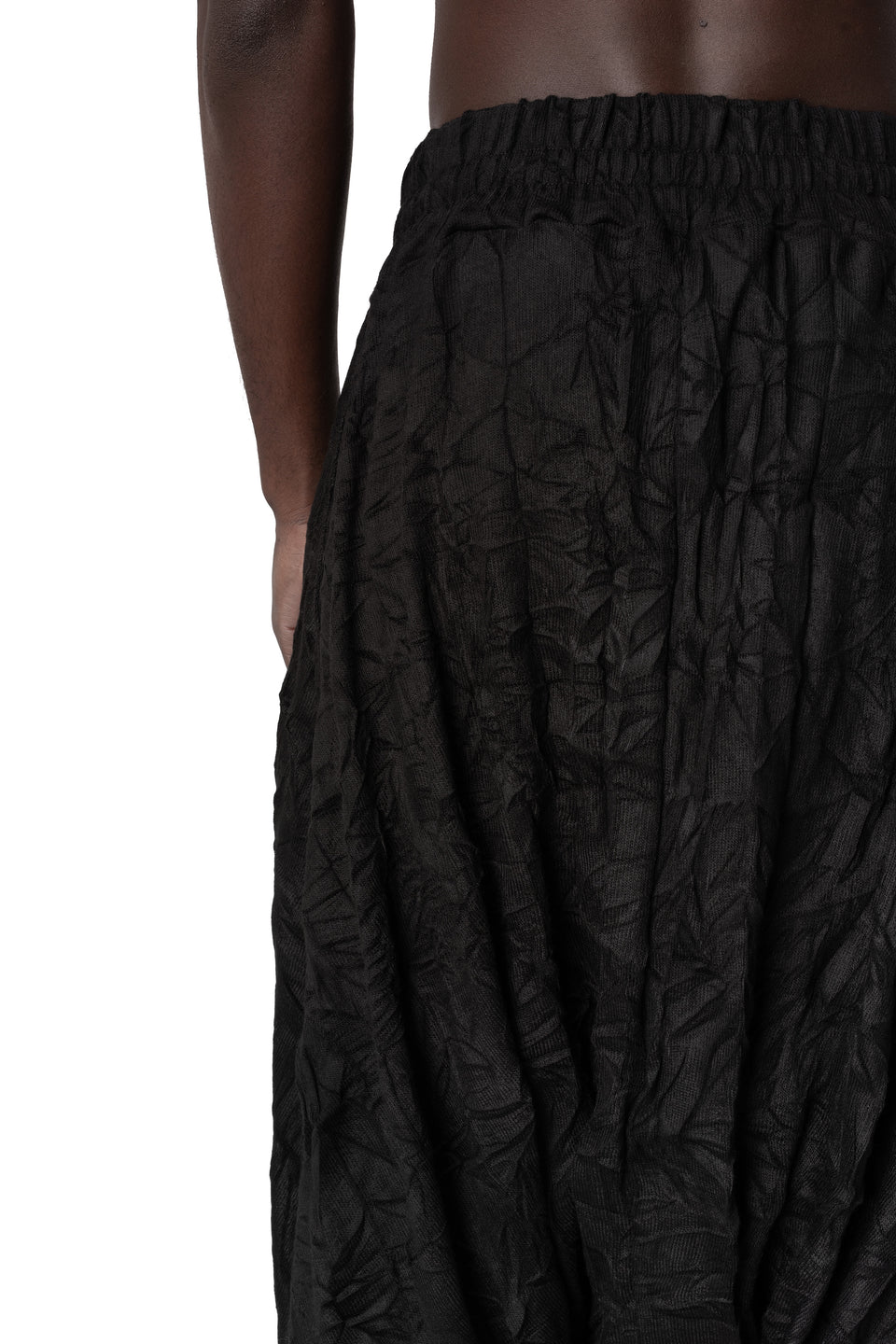 Oversized low-crotch wrinkled jersey trousers