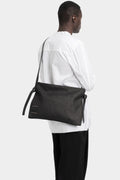 Stapled leather shoulder bag