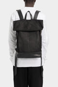 Silver stapled leather backpack