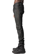 Coated stretch denim trousers