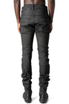 Coated stretch denim trousers
