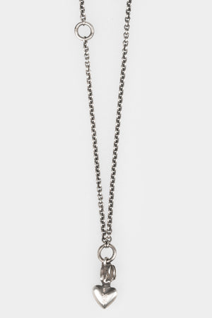Werkstatt München | Mini heart pendant necklace M7110SI, shot on table