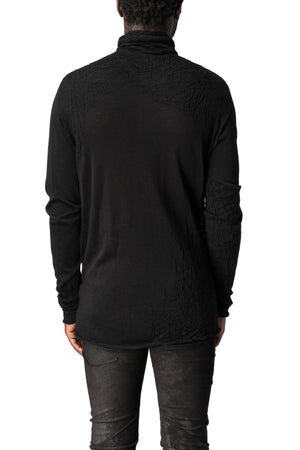 Light wool turtleneck sweater