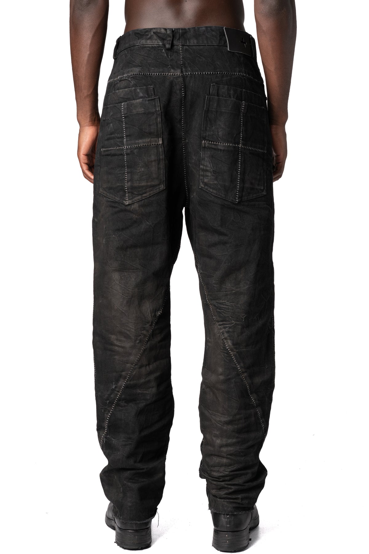 Loose fit treated denim jeans