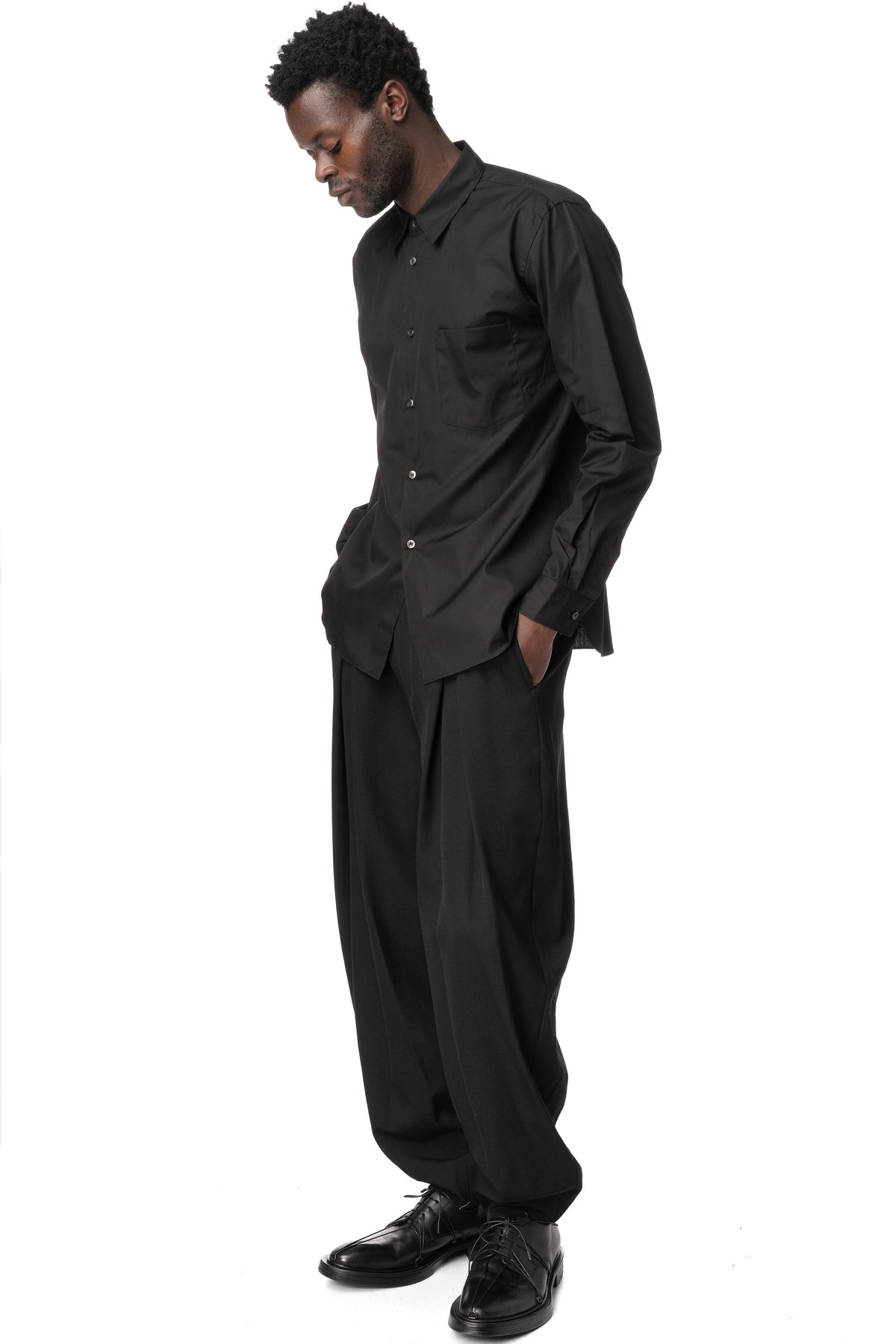 Double pleated tapered wool pants
