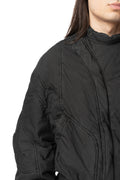 Padded typewriter cloth blouson