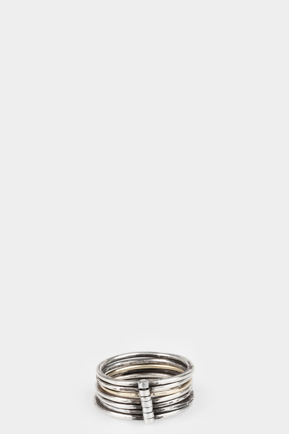 Certain pace | Crankshaft ring silver & gold, shot on table