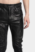 Coated skinny jeans