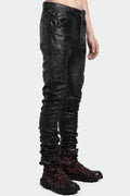 Coated skinny jeans