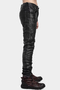Coated skinny jeans