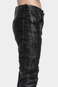 Coated skinny jeans