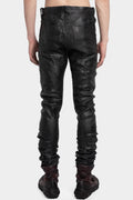 Coated skinny jeans