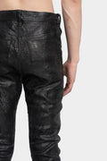 Coated skinny jeans
