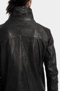 Buttoned leather over shirt