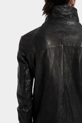 Buttoned leather over shirt